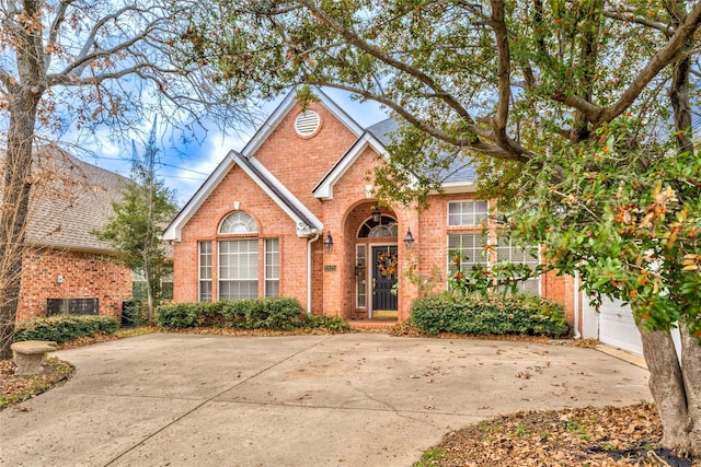 traditional home with brick siding