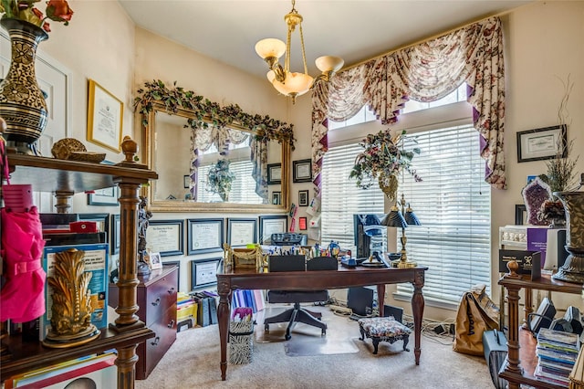 home office featuring a notable chandelier and carpet flooring