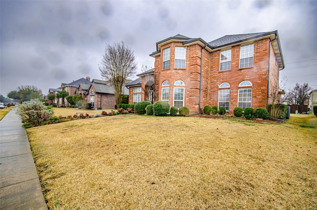 view of front facade with a front lawn