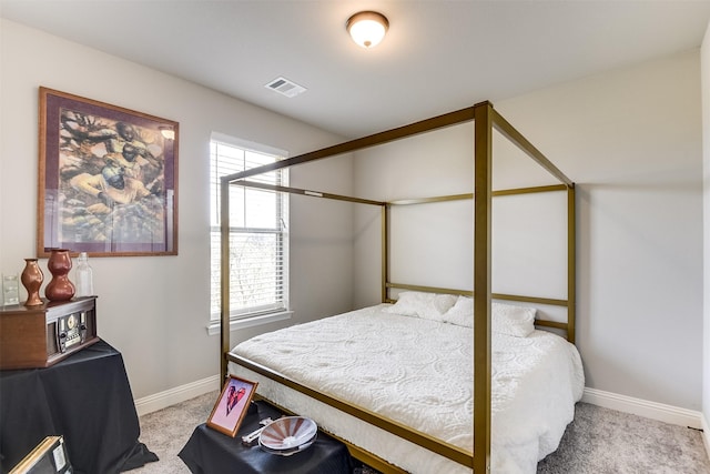 bedroom with light carpet