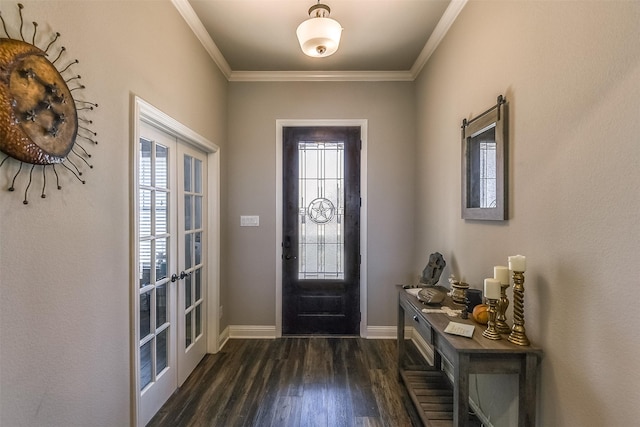 entrance foyer with dark wood-type flooring, crown molding, french doors, and a healthy amount of sunlight