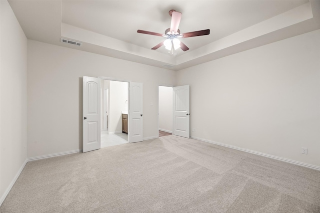 14317 Nebula Dr, Haslet, TX 76052 - carpeted spare room featuring a tray ceiling, baseboards, and visible vents