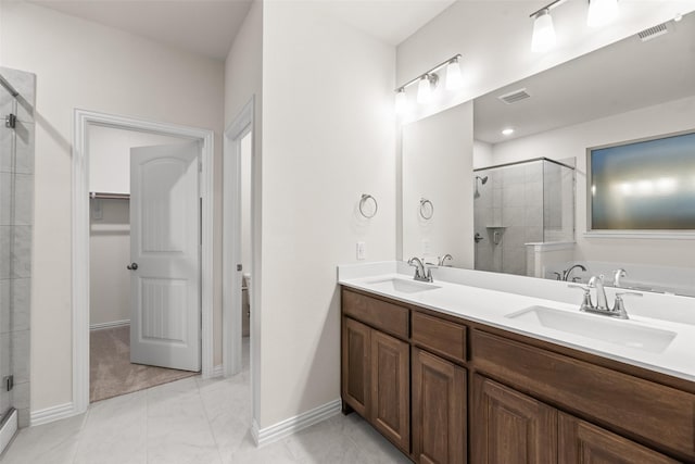 14317 Nebula Dr, Haslet, TX 76052 - full bathroom with double vanity, visible vents, a stall shower, and a sink