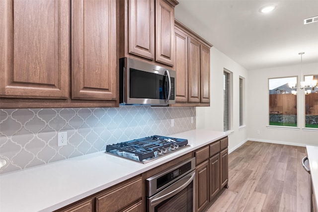 14317 Nebula Dr, Haslet, TX 76052 - unfurnished living room with ceiling fan, baseboards, dark wood-style floors, and visible vents