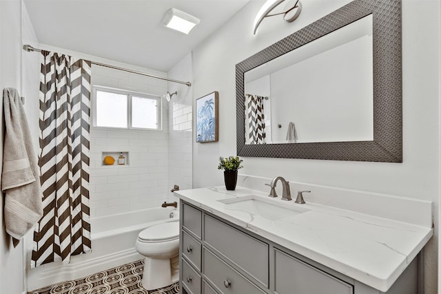 bathroom with shower / bath combination with curtain, vanity, toilet, and tile patterned floors