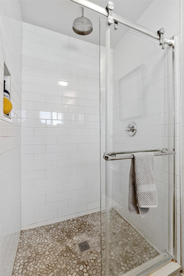 bathroom with a stall shower