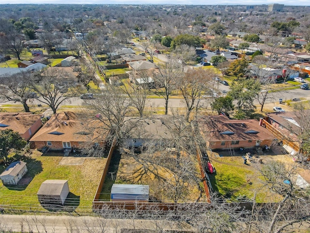 birds eye view of property with a residential view