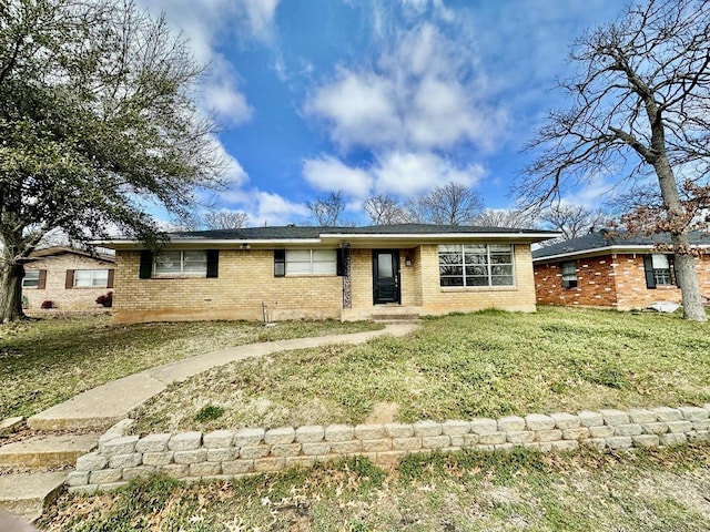 single story home with a front yard