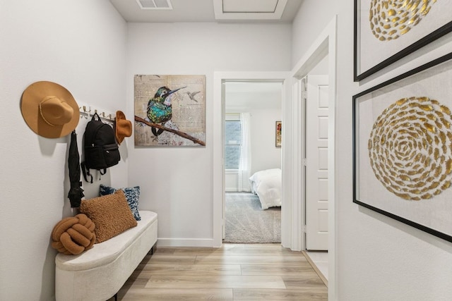 hallway featuring light wood-type flooring