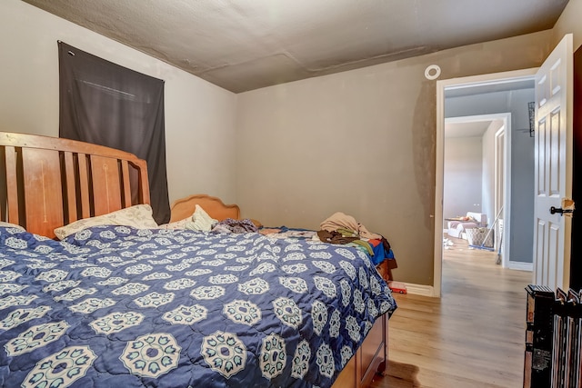 bedroom featuring light hardwood / wood-style floors