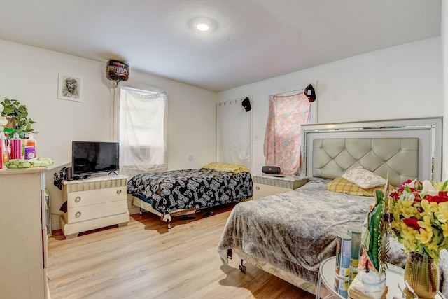 bedroom featuring light wood-type flooring