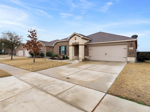 single story home with a front lawn and a garage