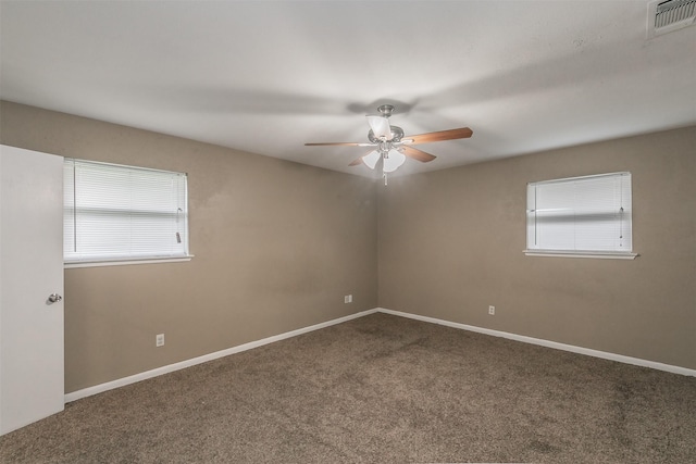 carpeted empty room with ceiling fan