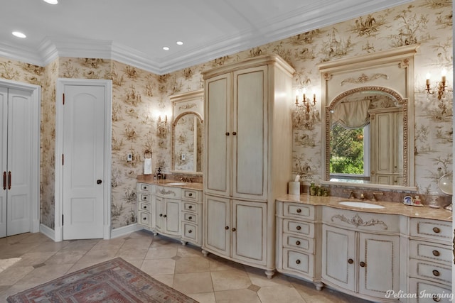 bathroom with ornamental molding, vanity, and tile patterned floors