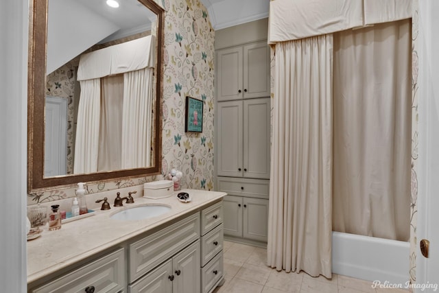 bathroom featuring shower / bath combo with shower curtain, tile patterned flooring, and vanity