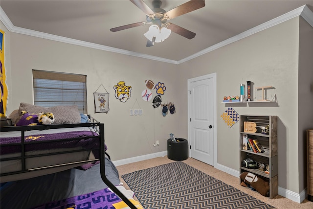 bedroom featuring ceiling fan, crown molding, and carpet flooring