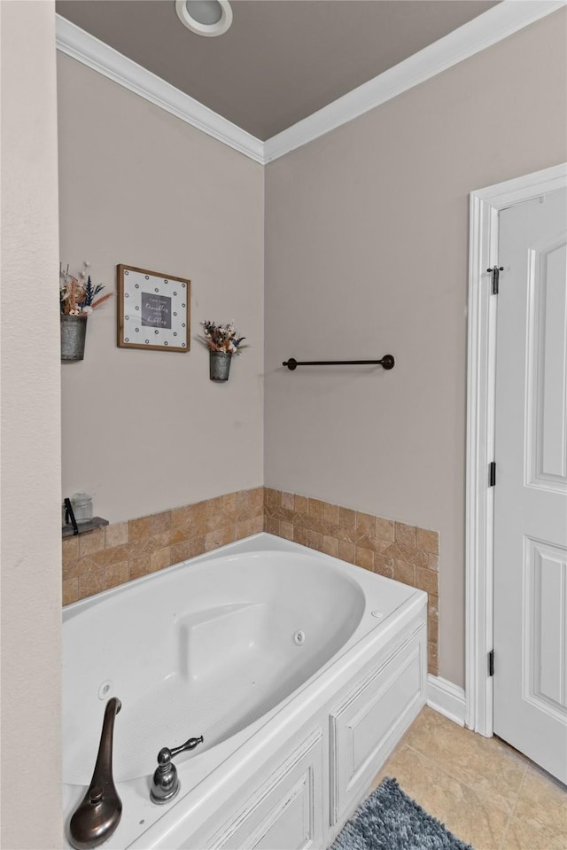 bathroom featuring ornamental molding, tile patterned flooring, and a tub