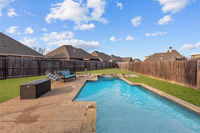 view of pool featuring a yard and a patio area