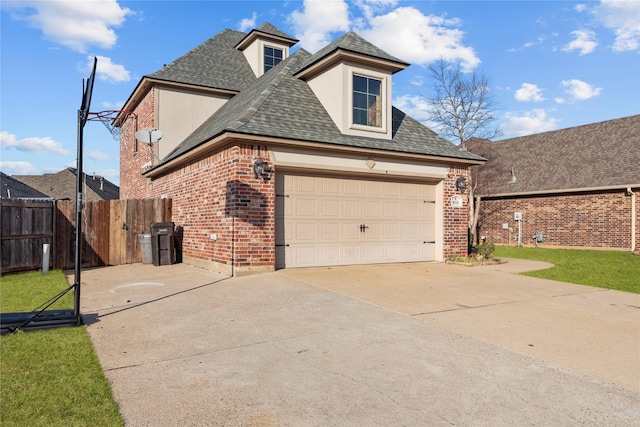 view of side of home with a garage