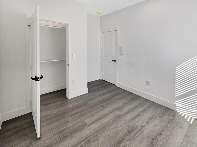 6130 Inca Dr, Mabank, TX 75156 - unfurnished bedroom featuring baseboards and wood finished floors