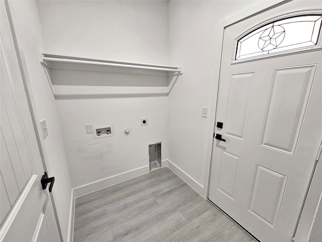 6130 Inca Dr, Mabank, TX 75156 - washroom featuring hookup for a gas dryer, washer hookup, laundry area, light wood-style floors, and hookup for an electric dryer
