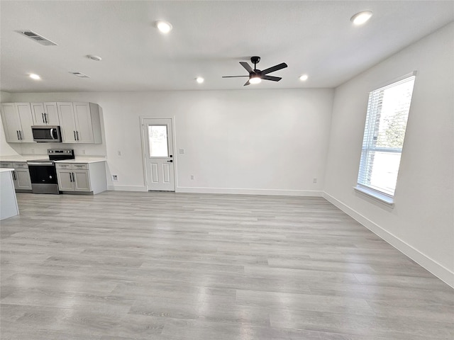 6130 Inca Dr, Mabank, TX 75156 - unfurnished living room with baseboards, visible vents, and recessed lighting