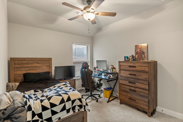 bedroom featuring light carpet, vaulted ceiling, and ceiling fan