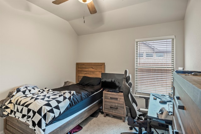 bedroom featuring light carpet, vaulted ceiling, and ceiling fan