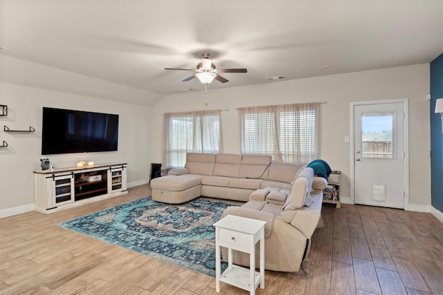 living room featuring light wood-type flooring, lofted ceiling, and ceiling fan