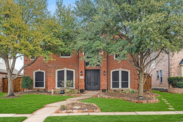 view of front facade with a front yard