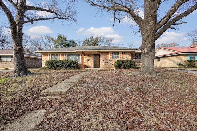 ranch-style home with brick siding