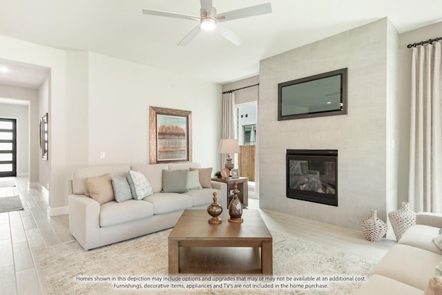 9352 Wildcat Rdg, Godley, TX 76044 - living room with ceiling fan and a fireplace