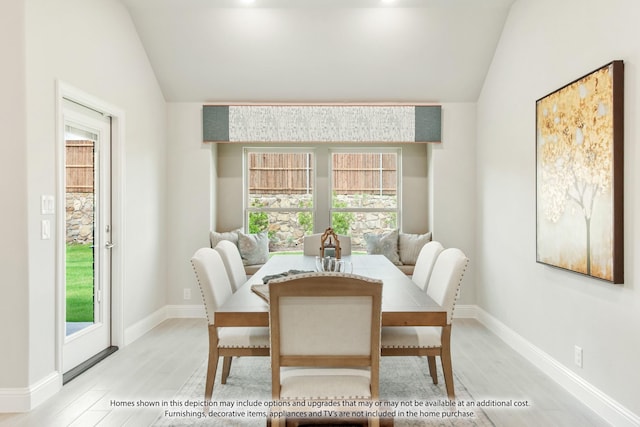 9352 Wildcat Rdg, Godley, TX 76044 - dining space with light hardwood / wood-style floors and vaulted ceiling