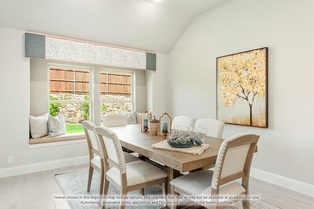 9352 Wildcat Rdg, Godley, TX 76044 - dining area featuring light hardwood / wood-style flooring and vaulted ceiling