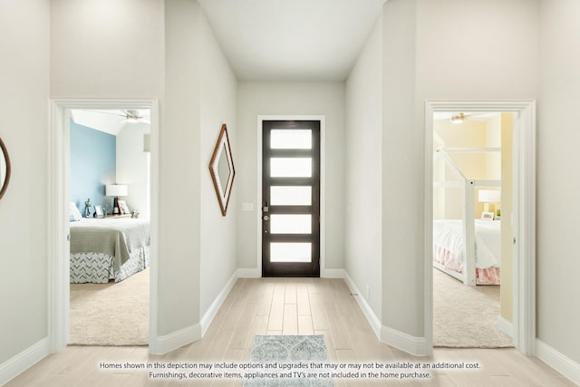 entrance foyer with light wood-type flooring