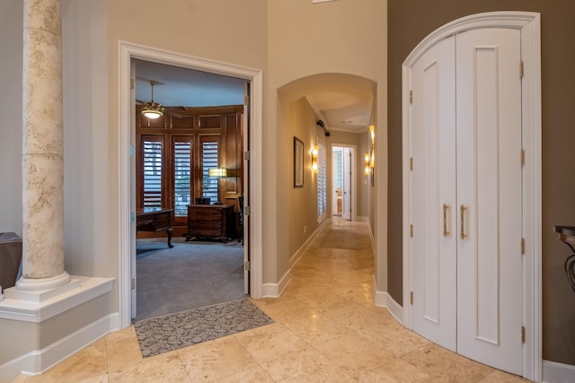 corridor with light colored carpet