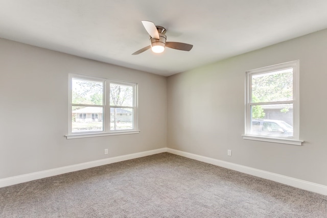 unfurnished room featuring carpet and ceiling fan