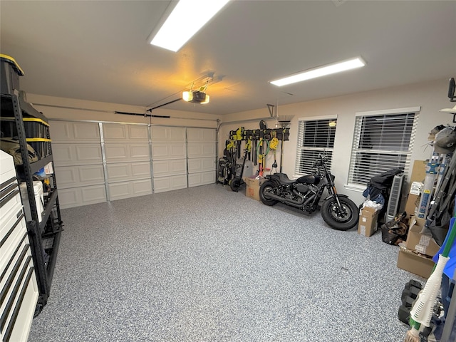 garage featuring a garage door opener