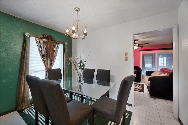 dining space featuring an inviting chandelier