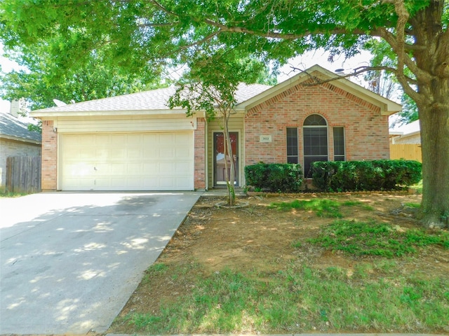 ranch-style home featuring a garage