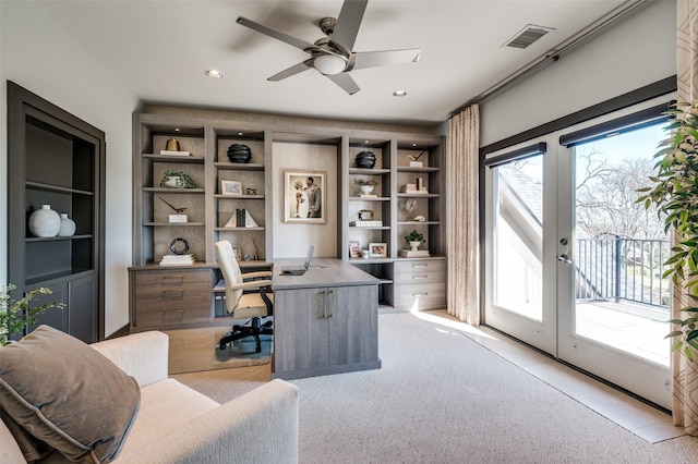 home office featuring french doors and ceiling fan