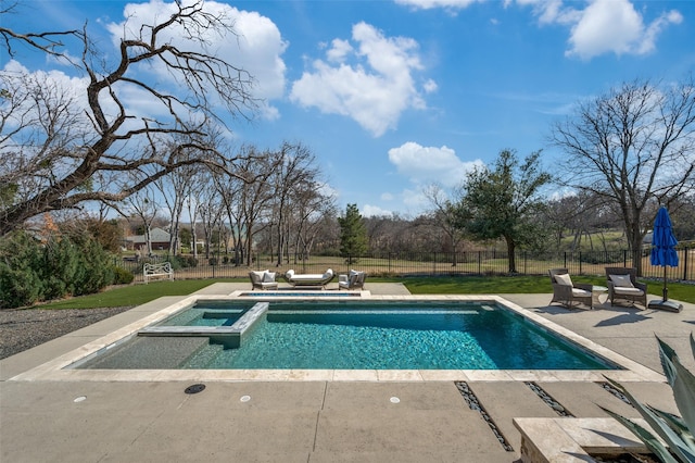 view of pool with a lawn, an in ground hot tub, an outdoor hangout area, and a patio area