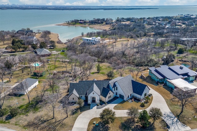 drone / aerial view featuring a water view