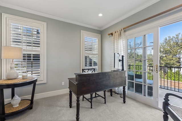 office area with crown molding and light colored carpet