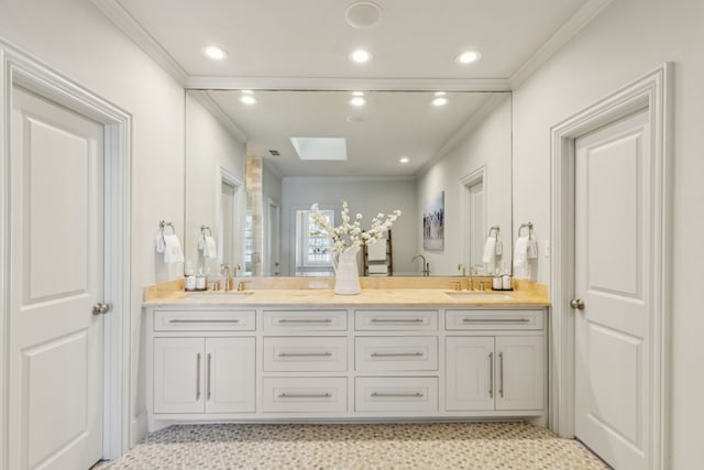 bathroom with vanity and crown molding