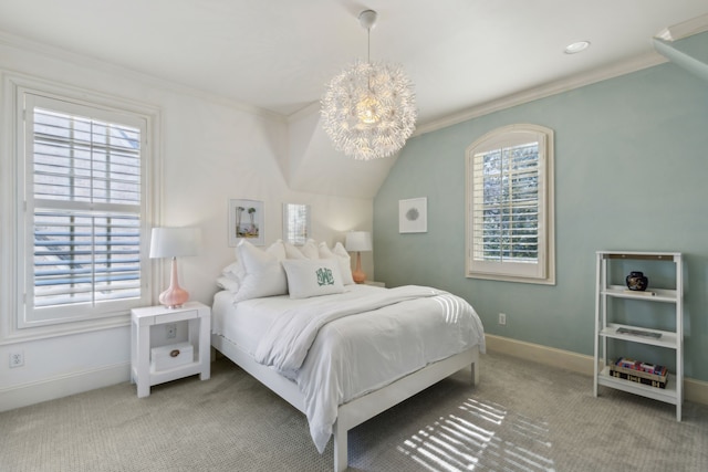 bedroom with a chandelier, crown molding, and carpet