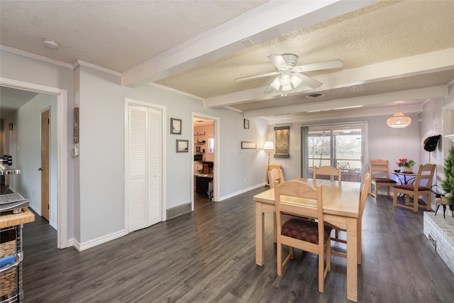 dining room with crown molding, beamed ceiling, dark wood-type flooring, and a textured ceiling