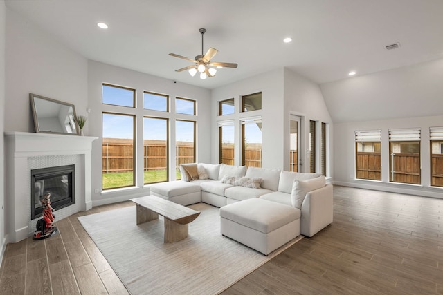 5716 Turner May Dr, Fort Worth, TX 76126 - living area featuring ceiling fan, a fireplace, wood finished floors, recessed lighting, and baseboards