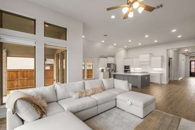 5716 Turner May Dr, Fort Worth, TX 76126 - living area featuring a ceiling fan, recessed lighting, wood finished floors, and lofted ceiling