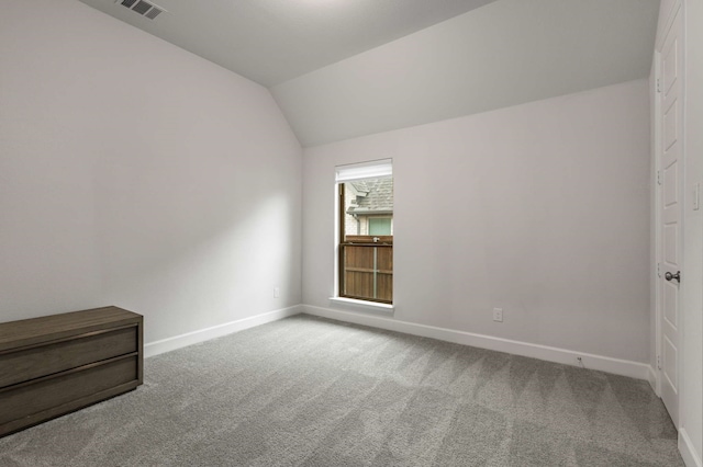 5716 Turner May Dr, Fort Worth, TX 76126 - spare room featuring carpet floors, baseboards, and vaulted ceiling